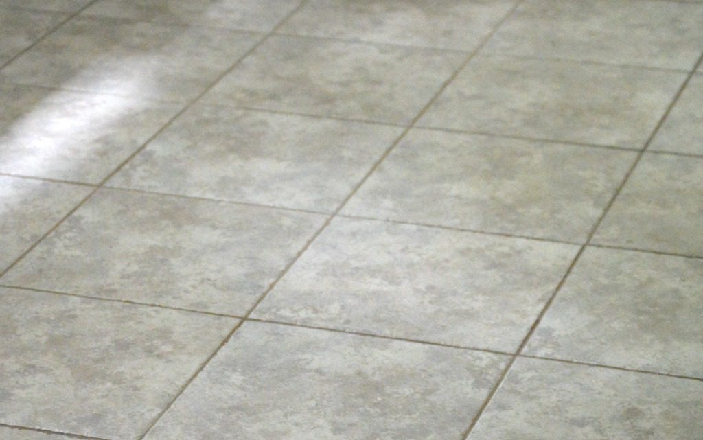 clean kitchen tile floor after being cleaned with eco-friendly DIY grout cleaner