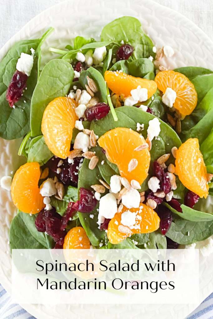baby spinach with mandarin oranges, dried cranberries, goat cheese and sunflower kernels