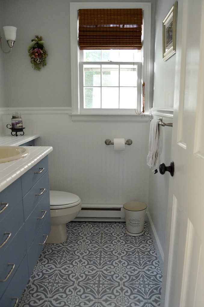 https://myfamilythyme.com/wp-content/uploads/2019/07/bathroom-floor-tile-stickers-one-year-later.jpg