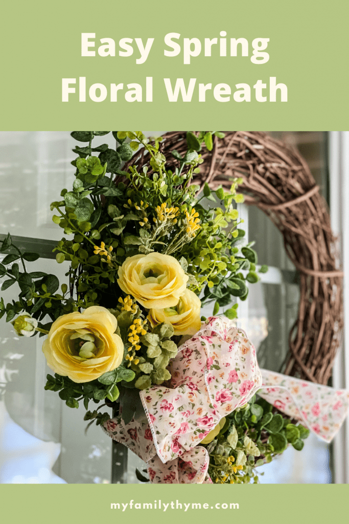 spring floral grapevine wreath with yellow flowers and greens on door