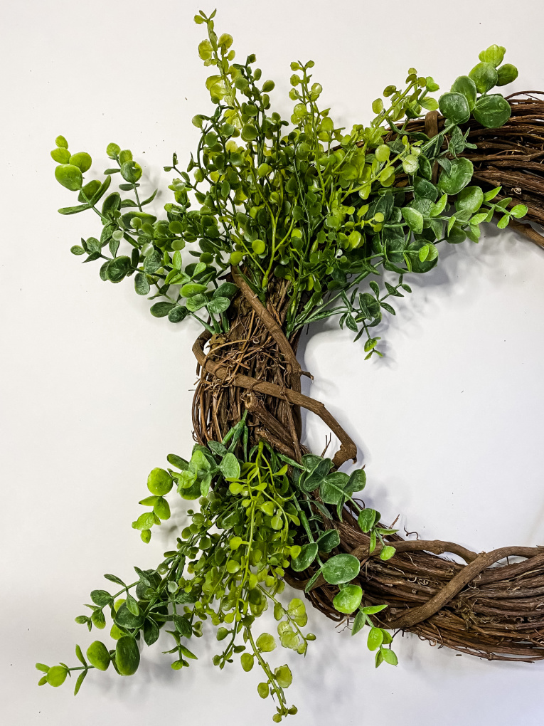 grapevine wreath with artificial greenery 