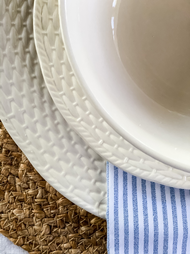 close up view of creamy white Nantucket Dinnerware from Birch Lane paired with diy cloth napkins