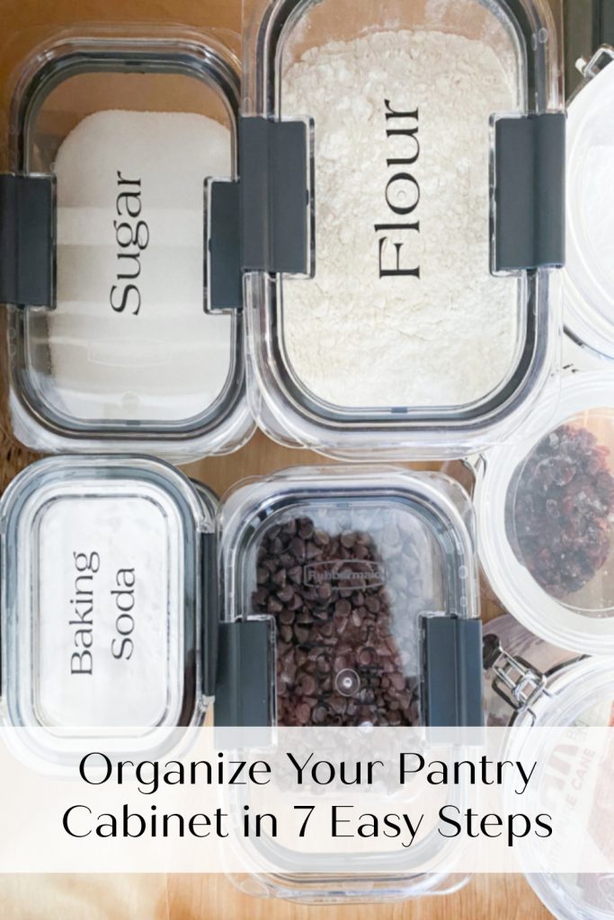 pull out pantry drawer with labeled rubbermaid plastic storage containers filled with dry baking goods