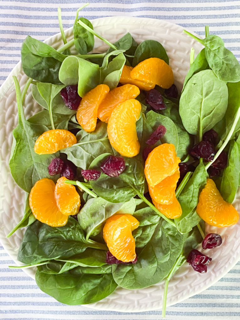 baby spinach with craisins and mandarin oranges