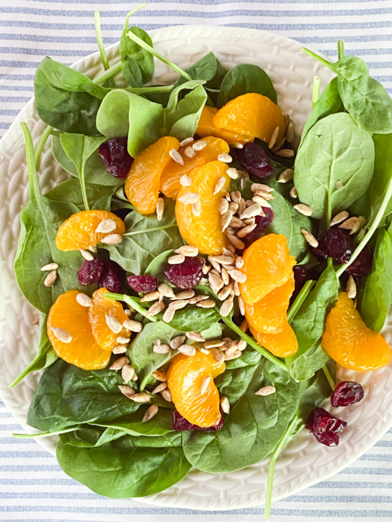 baby spinach with craisins, mandarin oranges, and sunflower seeds