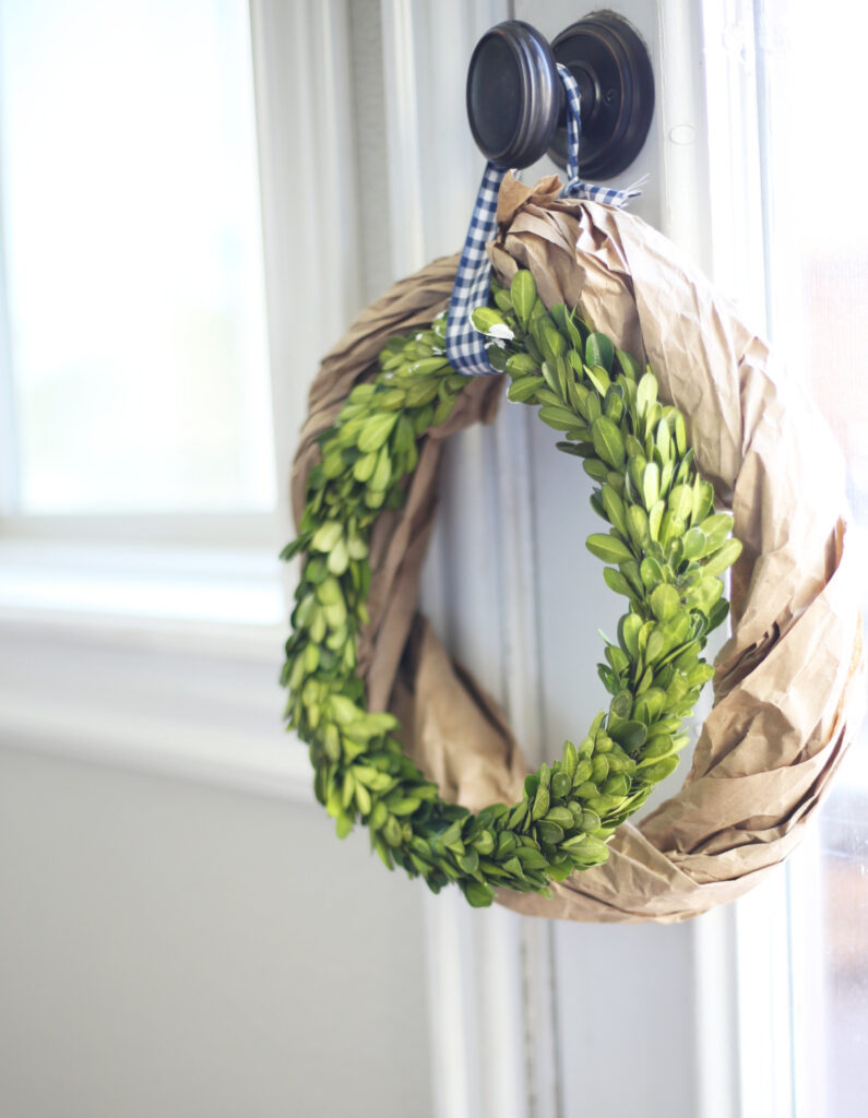 wreath made from packaging paper and greenery