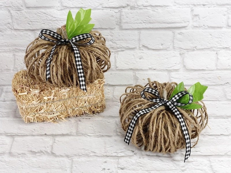 view of 5 minutes twine pumpkins with buffalo check ribbon