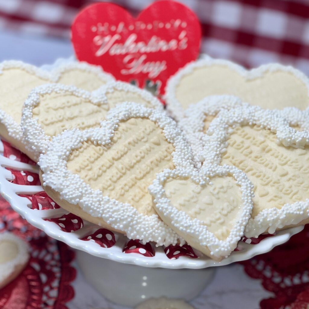 embossed heart shaped Valentine cookies on a plate