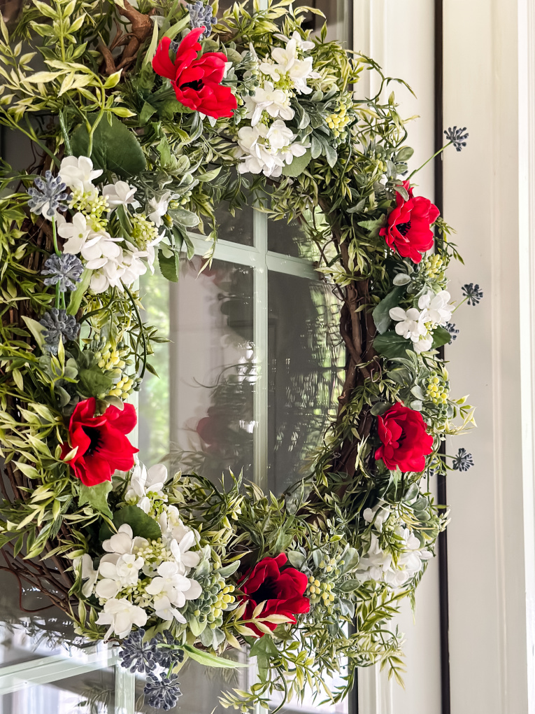 DIY summer red white and blue floral wreath on backdoor