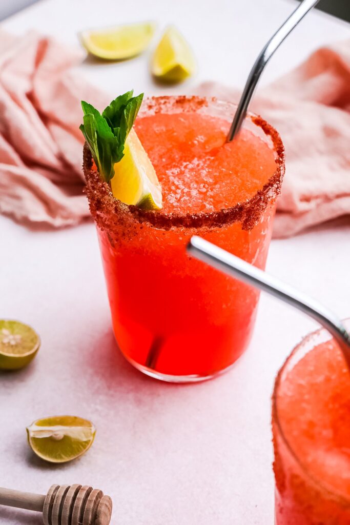 photo of Aperol Margarita in a glass with a spicy salted rim