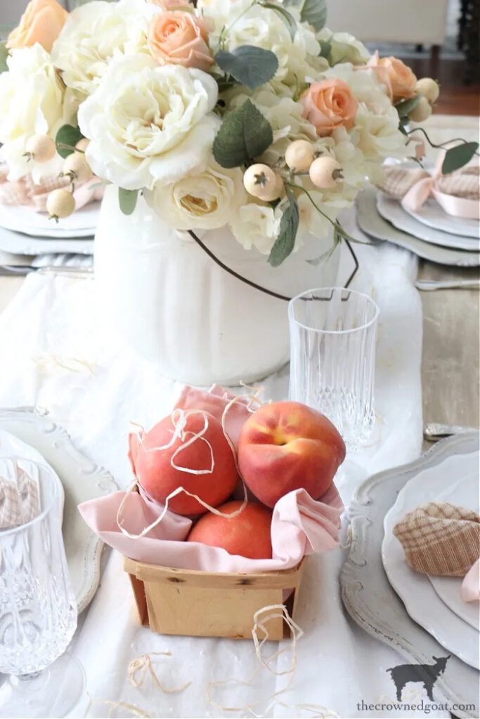 peaches in a basket on summer tabletop