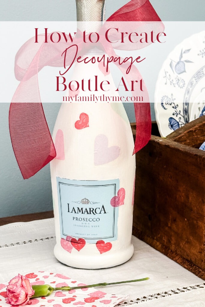 Decoupage Bottle Art made with a Prosecco bottle painted white and decoupaged with Valentine's Day napkins